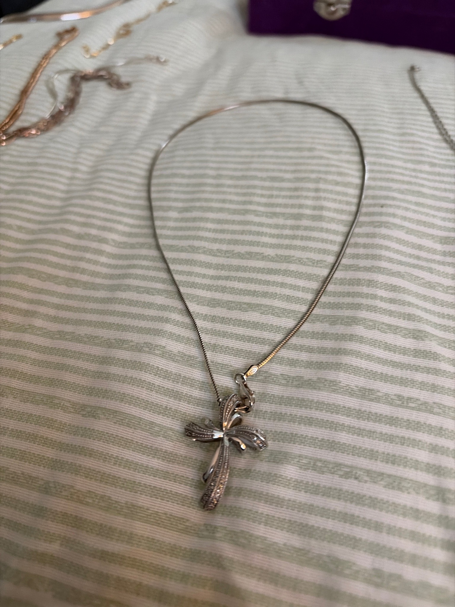 Submitted photo of Silver-tone cross pendant necklace (not authenticated)