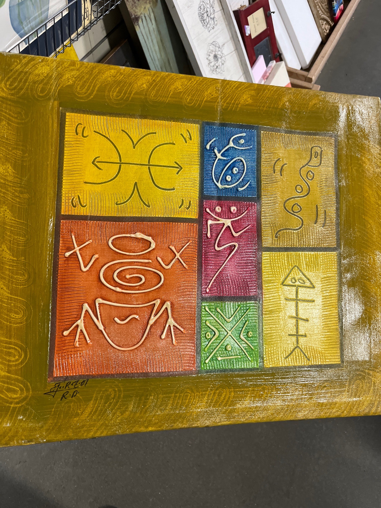 Submitted photo of Mixed media panel painting signed 'J. R. E. 01'