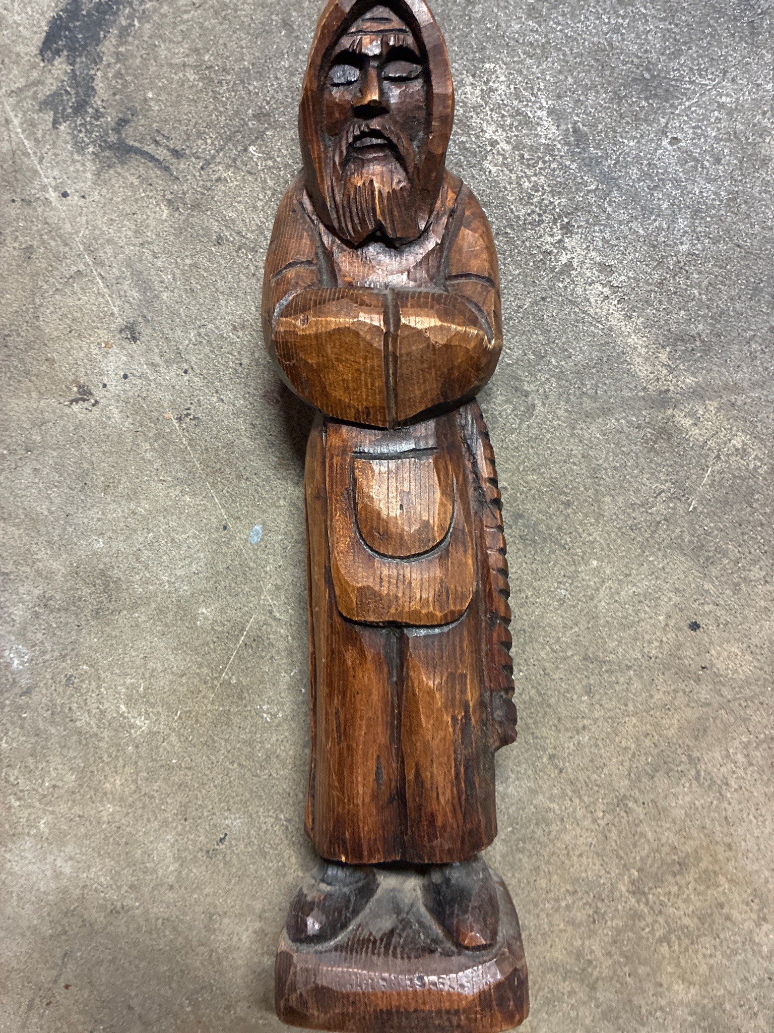 Submitted photo of Hand-carved wooden monk figurine
