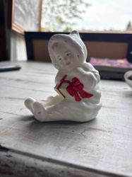 Baby in Snowsuit with Present Figurine