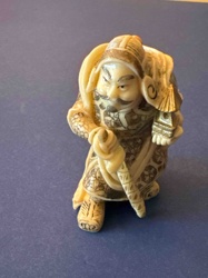 Japanese Ivory Netsuke of a Warrior or Deity with Pagoda/Lantern