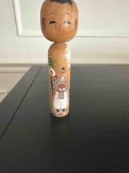 Japanese Kokeshi Doll depicting Figures and Crane