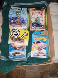Assortment of Hot Wheels Die-Cast Cars (DC Comics, Disney, Cereal, The Simpsons)