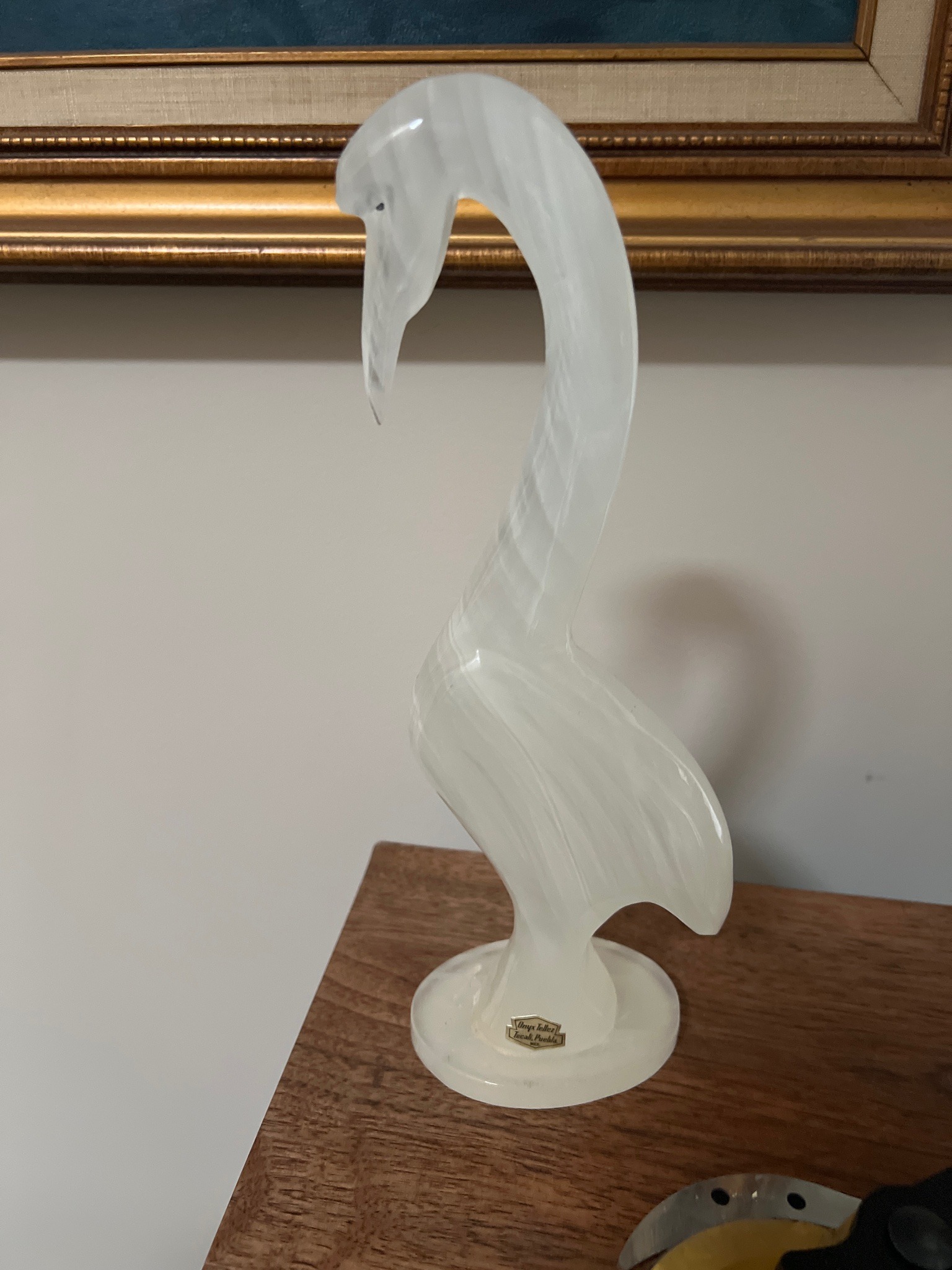 Submitted photo of Carved stone swan figurine, bearing a label reading 'Onyx Tellez Tecali Puebla'