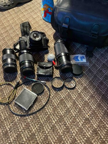 Vintage SLR Camera Kit with Multiple Lenses and Accessories