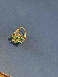 Yellow Gold Cluster Ring with Green Gemstones and Central Diamond Accent