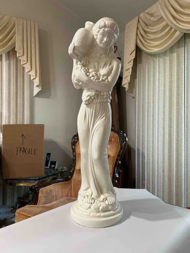 Classical Style Female Figure with Grape Harvesters' Jug and Grapes