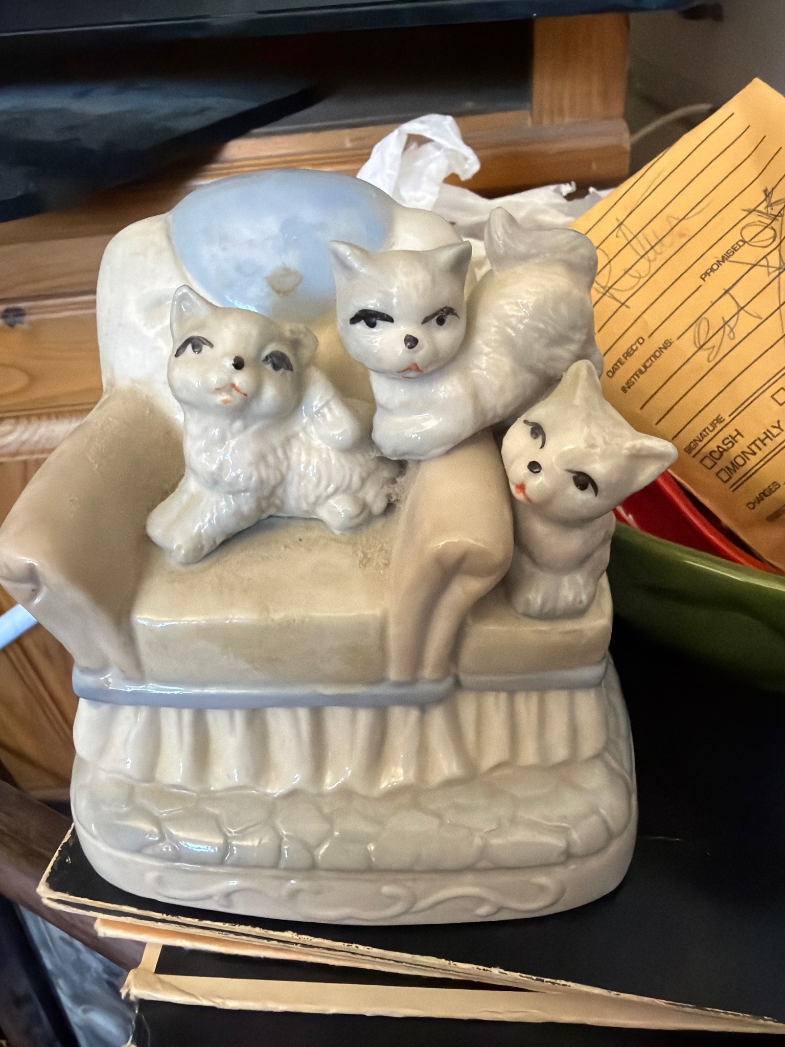 Submitted photo of Ceramic Figurine of Three Kittens on an Armchair