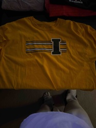 Yellow T-shirt with 'I' and stripes graphic