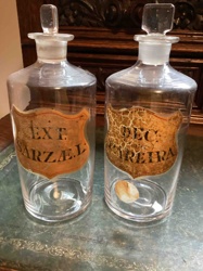 Pair of Antique Glass Apothecary Bottles with Ground Glass Stoppers and Original Labels