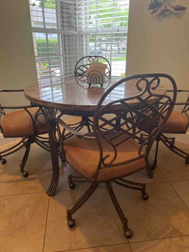 Wrought Iron and Marble Dining Set