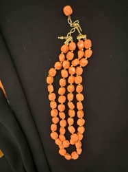 Multi-Strand Coral-Toned Beaded Necklace with Gold-Tone Accents