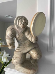 Stone Sculpture of an Indigenous Drummer
