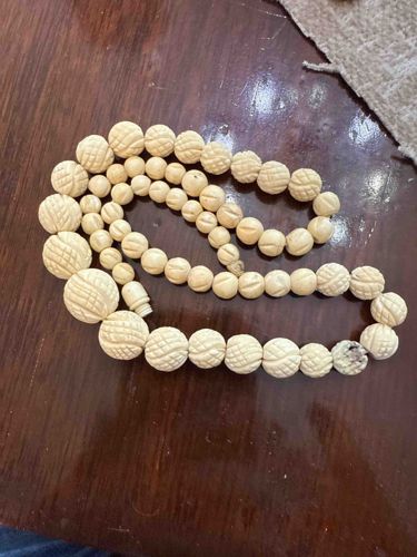 Graduated Carved Bead Strand