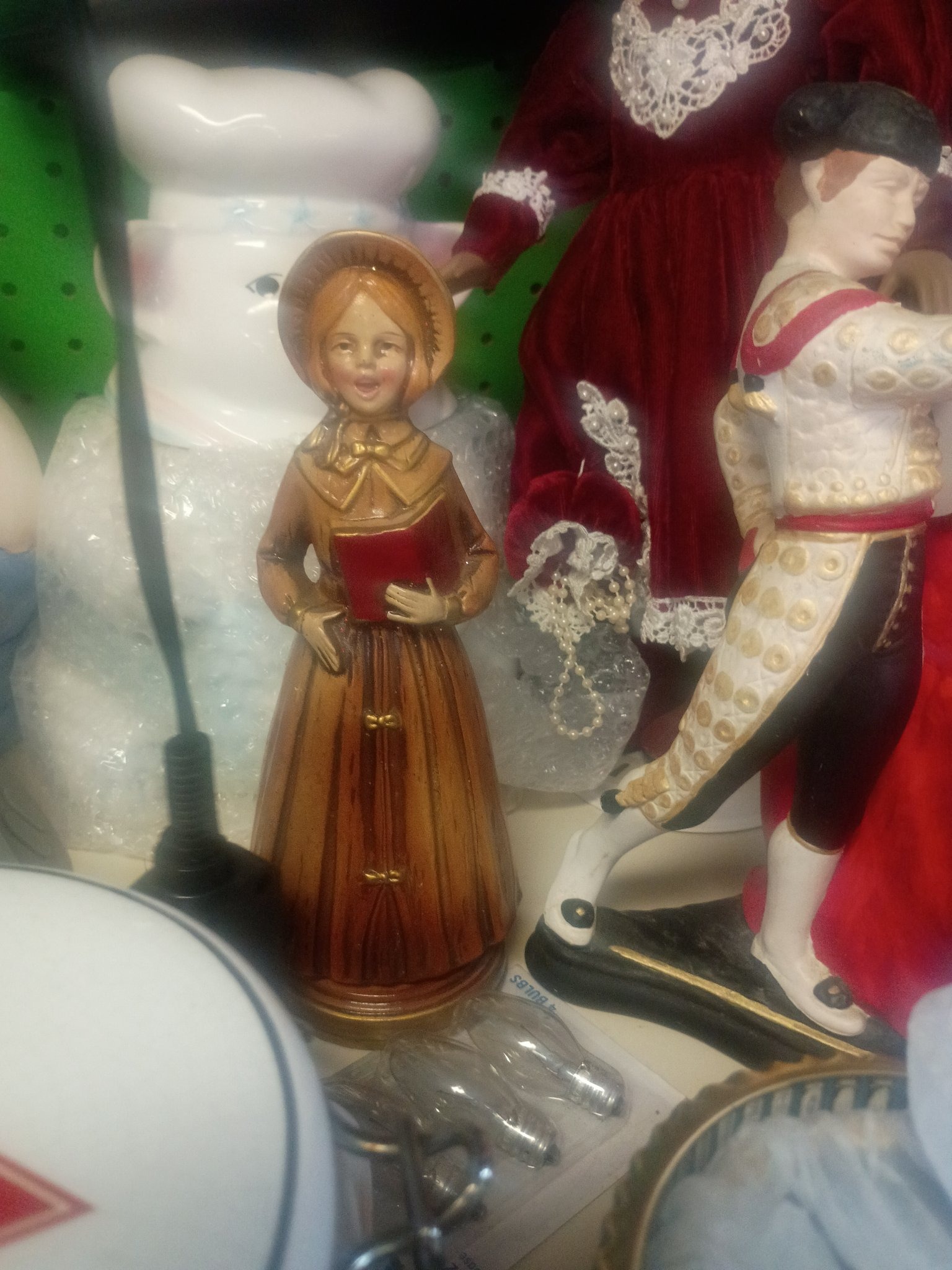 Submitted photo of Porcelain Caroler Figurine