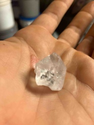 Clear Mineral Fragment with Inclusions