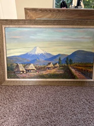 Mountain Landscape with Village and Thatched Huts