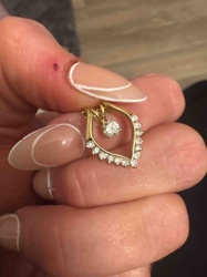 Gold and Diamond Heart-Shaped Pendant