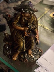 Seated Woman with Grapes Figurine