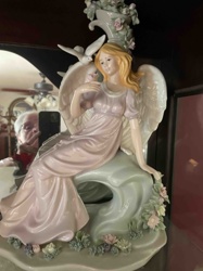 Porcelain Angel Figurine with Doves and Floral Accents