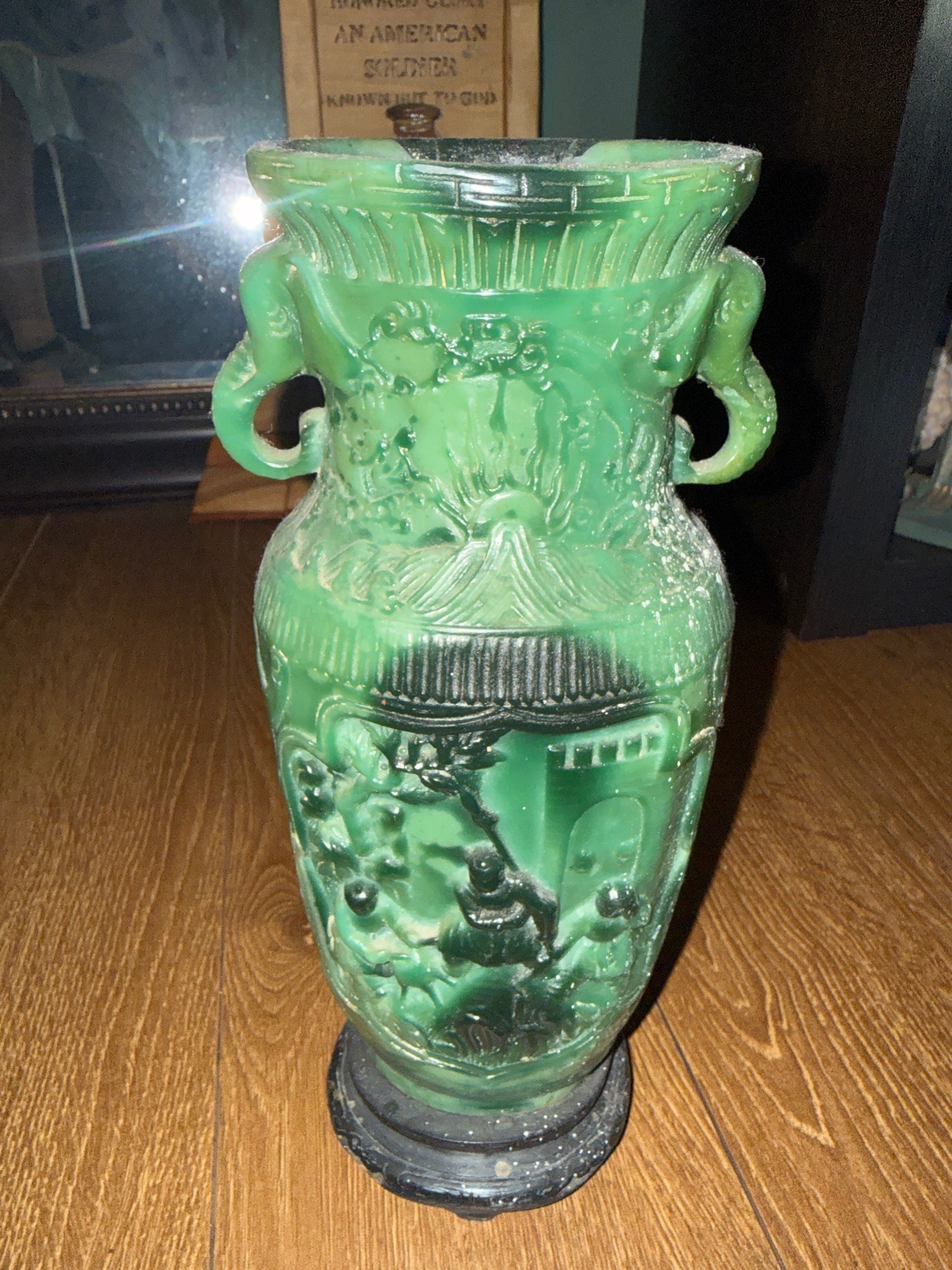 Submitted photo of Carved green glass vase