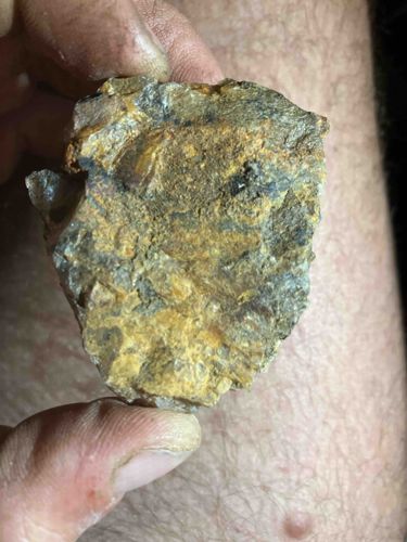 Mineral Specimen (possibly gold ore or pyrite-bearing quartz)