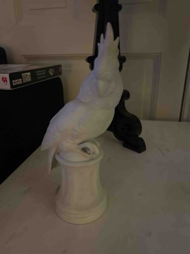 White Ceramic Cockatoo Statue on Pedestal