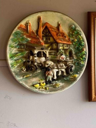 Relief Sculptural Wall Plate depicting a Village Scene