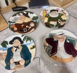 Four Bas-Relief Figural Decorative Plates