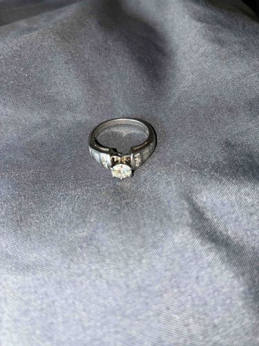 Diamond Solitaire Engagement Ring with Channel-Set Accents