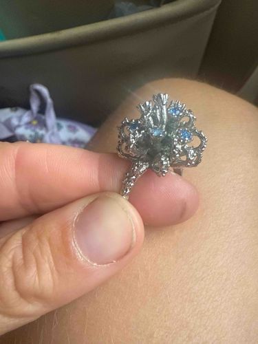 Ornate Silver-Toned Ring with Blue Gemstones