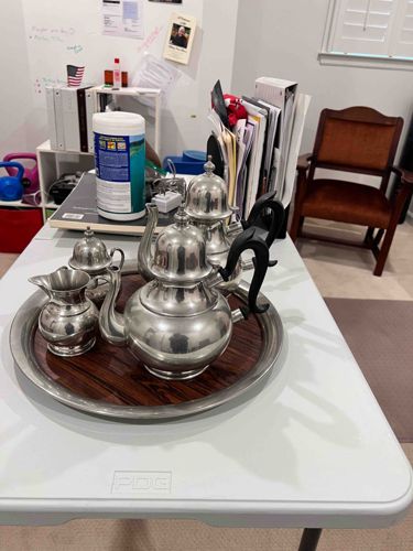 Silver-Toned Tea Set on Wooden Tray