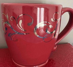 Red Ceramic Coffee Mug with Silver Scroll Decoration