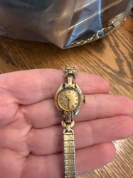 Vintage Ladies' Oval Gold-Toned Wristwatch with Articulated Bracelet