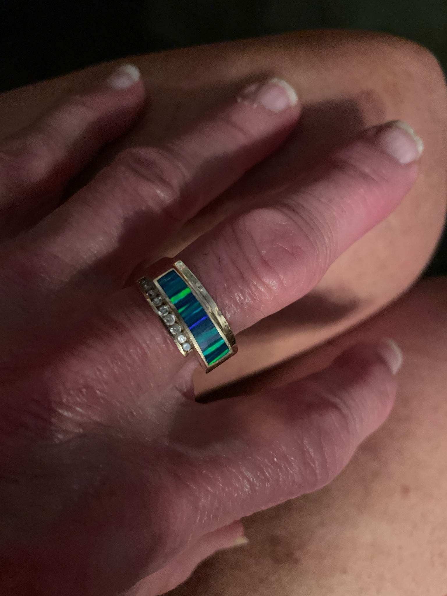 Submitted photo of Gold gemstone ring with opal and diamonds (not authenticated)