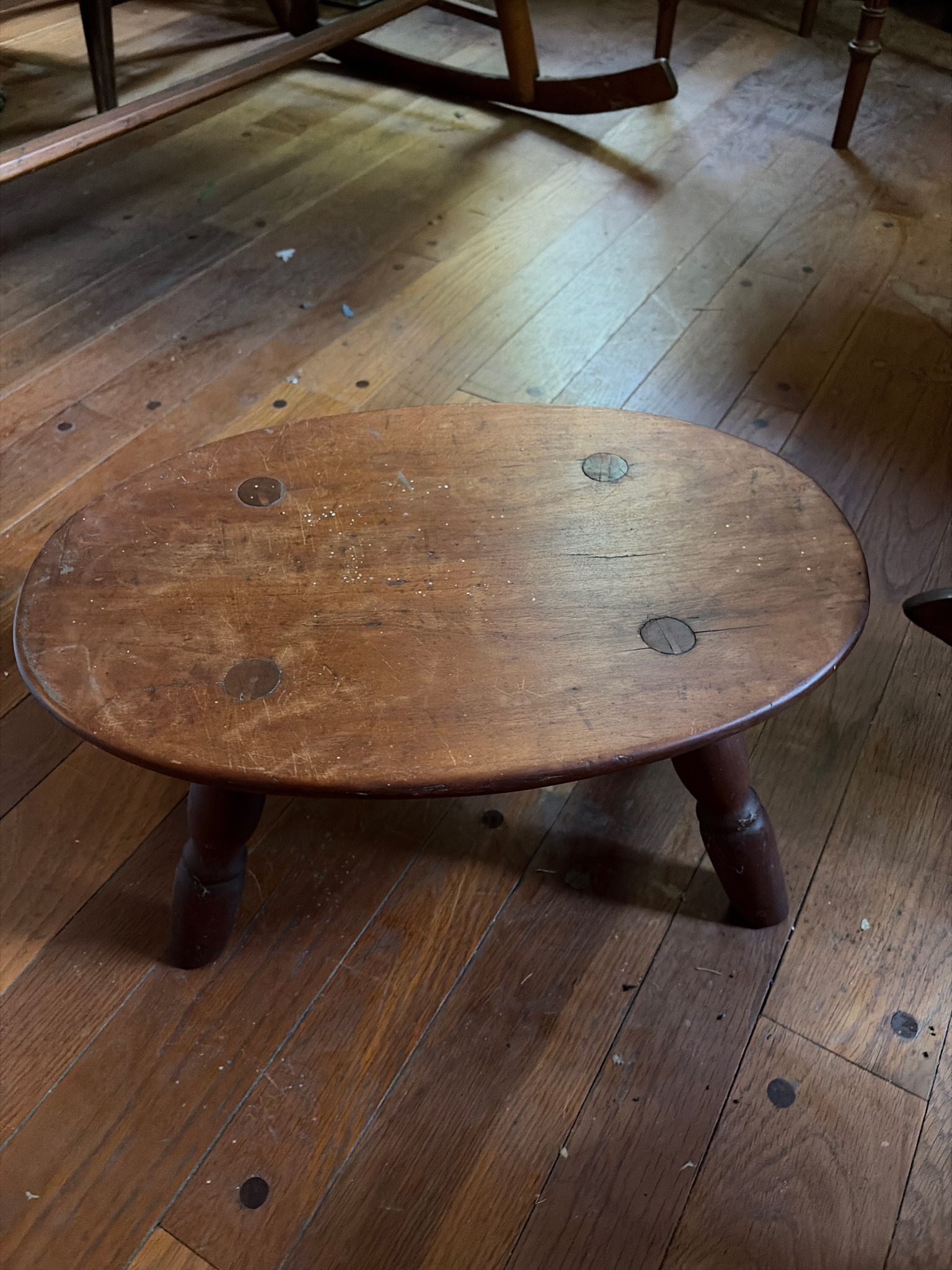 Submitted photo of Low oval wooden stool