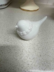 White Ceramic Bird Figurine with Lace-like Collar Detail
