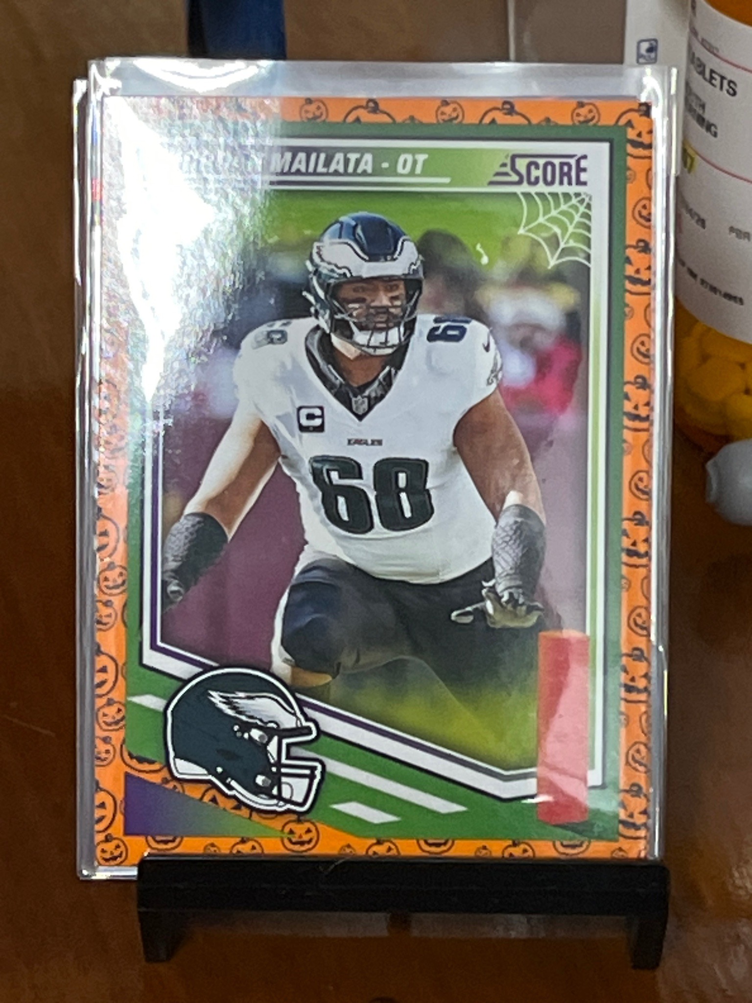 Jordan Mailata 2023 Panini Score Football 'Pumpkin' Parallel Card #159