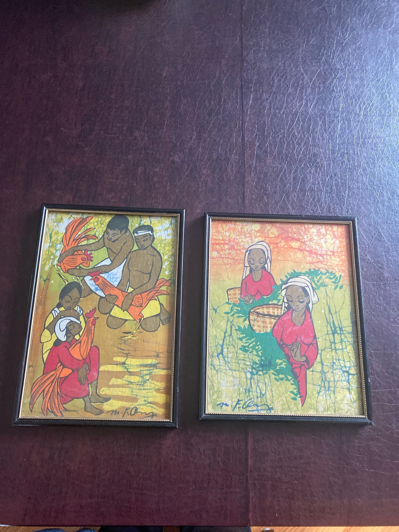 Submitted photo of Framed textile art signed 'M.F. Chong' (not authenticated)
