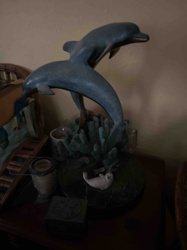 Two Dolphins Leaping from Coral Sculpture