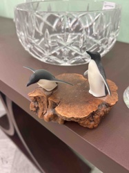 Penguin Figurines on Wood Burl