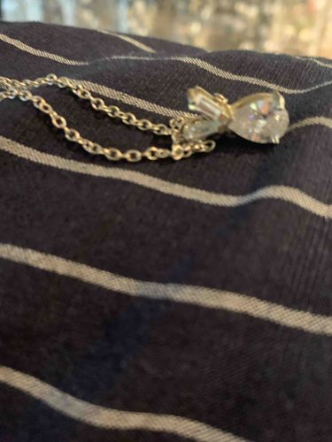 Silver-Toned Necklace with Pear and Baguette Stone Bow Pendant