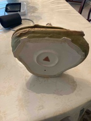 Underside of a Ceramic or Porcelain Figurine with Triangular Mark