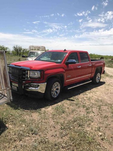 Red GMC Sierra Denali Crew Cab Pickup Truck