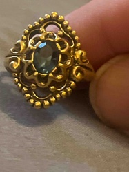 Ornate Gold Filigree Ring with Oval Dark Blue/Teal Gemstone
