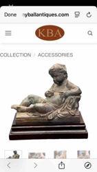 Bronze Putto Sculpture on Tiered Wooden Base