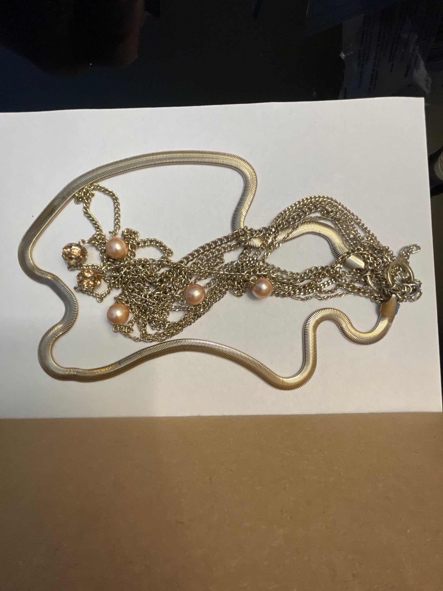 Submitted photo of Multi-strand fashion necklace with faux pearls and chain links