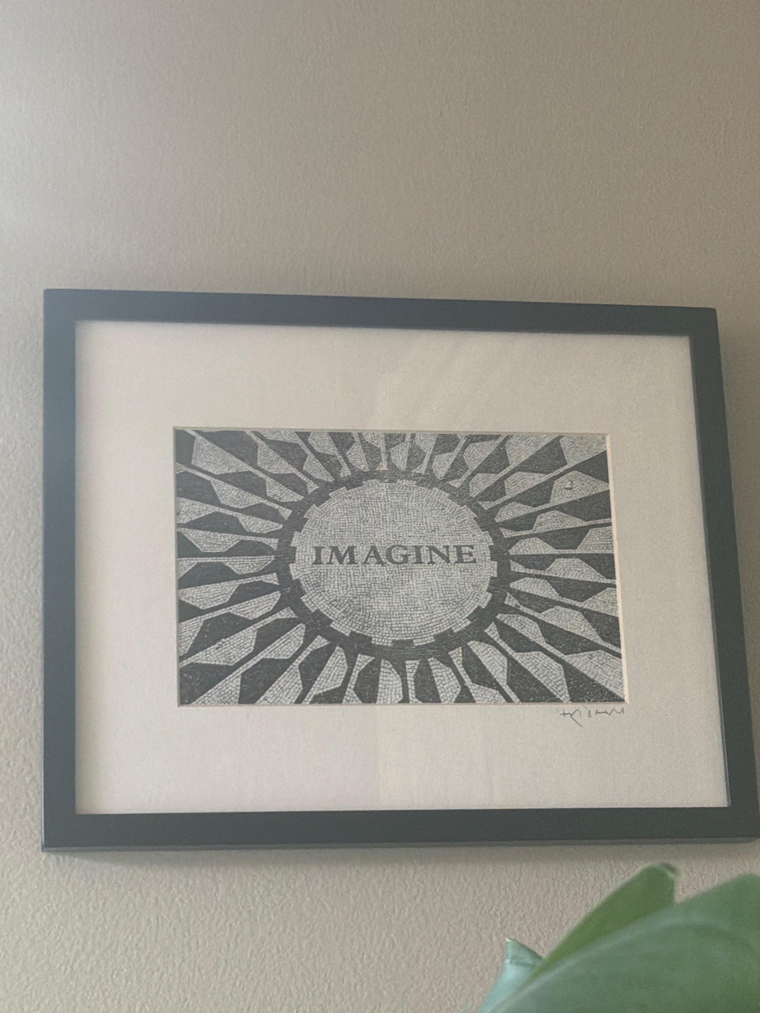 Submitted photo of Framed print featuring mosaic design with the word IMAGINE