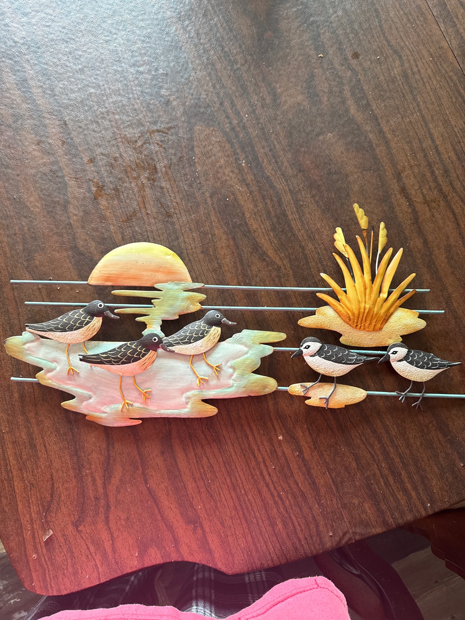 Submitted photo of Metal wall art sculpture depicting shorebirds and sunset