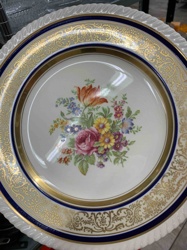 Decorative Porcelain Plate with Floral Medallion and Gilt Border